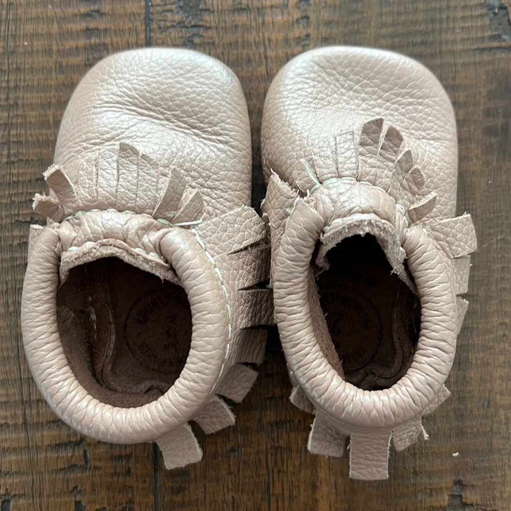Tan infant freshly picked moccasins